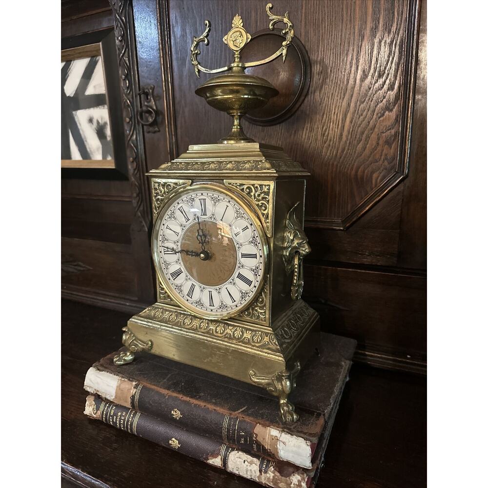 Antique Brass French mantel clock with lions Bubble Glass